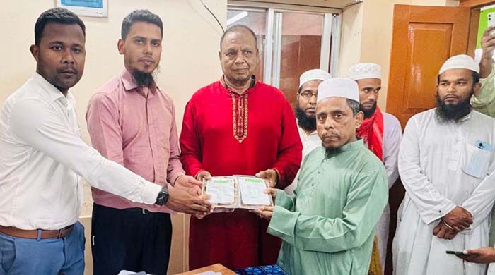 পাংশায় সৌদি সরকারের উপহারের  খেজুর পেল ৮৪ মাদ্রাসা-এতিমখানা